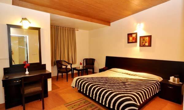 Hotel Suman Paradise Nainital Rom bilde